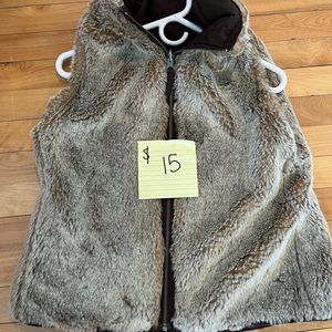 Reversible faux fur/brown vest